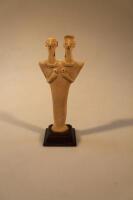An Egyptian two headed bird carving
