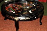 A 20thC Chinese lacquered coffee table