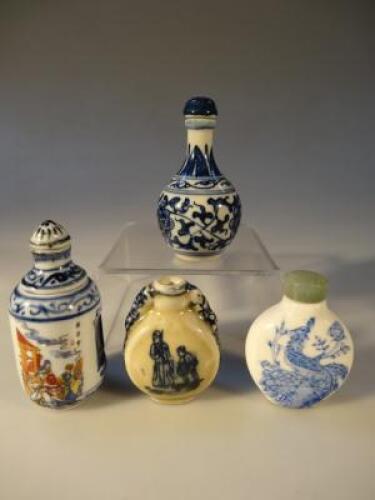 Four blue and white snuff bottles.