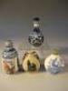 Four blue and white snuff bottles.