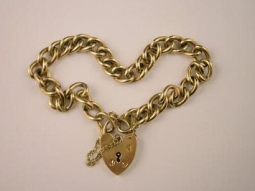 A 9ct gold charm bracelet