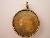 A coin pendant