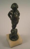 M Claymore. An Art Deco Style figure of a young nude standing on a snail