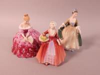 Three Royal Doulton porcelain ladies