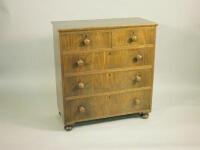 An early 19thC mahogany chest of two short and three long drawers