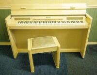 An Eavestaff mini piano