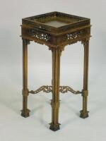 A mahogany urn stand in George III style