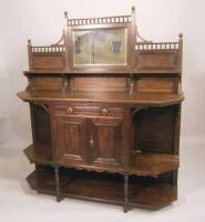 An early 20thC stained oak sideboard