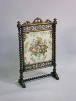 A 19thC walnut firescreen