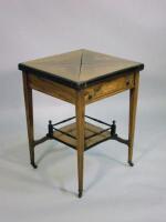 A late Victorian rosewood and marquetry envelope card table