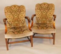 A pair of mahogany Gainsborough type open armchairs