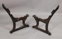 A pair of early 20thC cast iron bench end supports