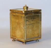 A brass George V commemorative tobacco jar.