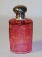 A cranberry glass scent bottle