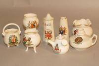 A selection of crested ware urns