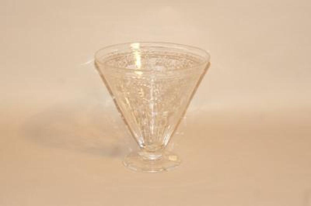 A Victorian style cut glass conical vase