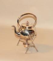 A late Victorian silver plated tea kettle