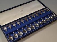 A set of twelve silver zodiac spoons by John Pinches