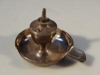An Edwardian silver ashtray and lighter