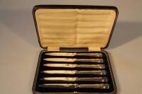A set of six George V silver handled butter knives