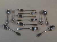 A set of eleven George IV fiddle pattern silver teaspoons and a later fiddle pattern teaspoon