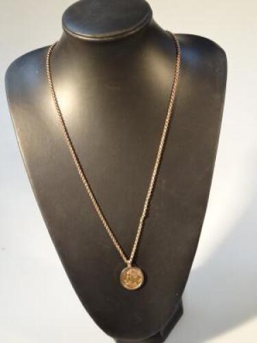 A full gold sovereign pendant