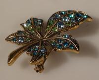 A Harrods leaf brooch