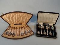 Two sets of silver coffee spoons