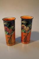 A pair of Shelley lustre cylindrical vases painted with fruit