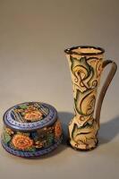 A Wade Gothic slender ewer and an Art Deco Celtic style pottery sewing box painted with flowers