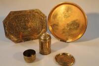 Middle Eastern brass ware including two trays cylindrical tobacco jar