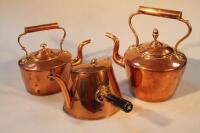 Two copper kettles and a half kettle.