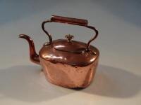 A 19thC copper kettle.