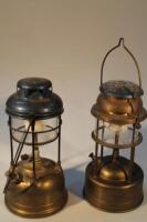 Two 20thC Tilley lamps.