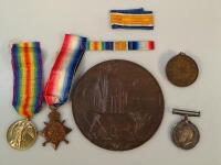 A WWI medal group and bronze memoriam plaque