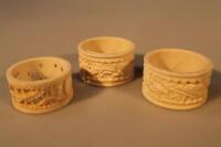 Three late 19thC ivory carved napkin rings