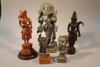 Five carved figures of Indian gods.