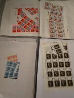 Two pocket folders containing full and part sheets of pre-decimal stamps.