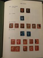 A stamp album containing Victorian and later British stamps