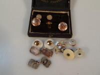 A small selection of cufflinks and shirt studs