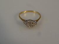 An 18ct gold diamond cluster dress ring