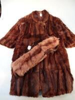 A mink coat and mink neck warmer.