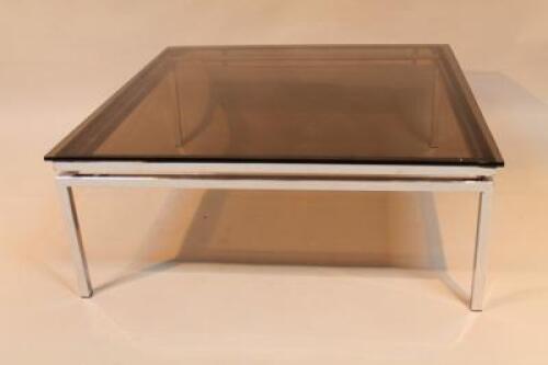 A 1960's chrome and smoke glass coffee table