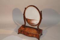 A George III mahogany veneered dressing table mirror