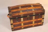 A 19thC domed cabin trunk.