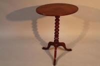 A 19thC oval mahogany occasional table.