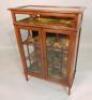 An Edwardian mahogany and satinwood cross banded display table