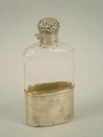 A silver and cut glass hip flask