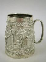 An Indian white metal mug