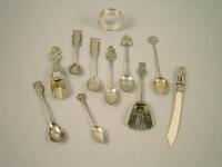 A quantity of small items of white metal